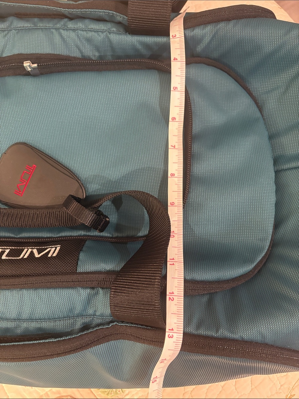 Tumi Teal Travel Duffel / backpack 
Very roomy to store things in very sturdy - Picture 13 of 13